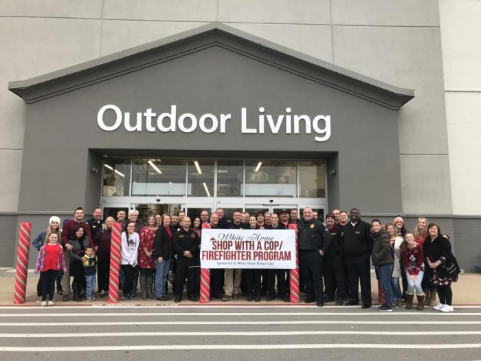 shop with a cop/firefighter group photo